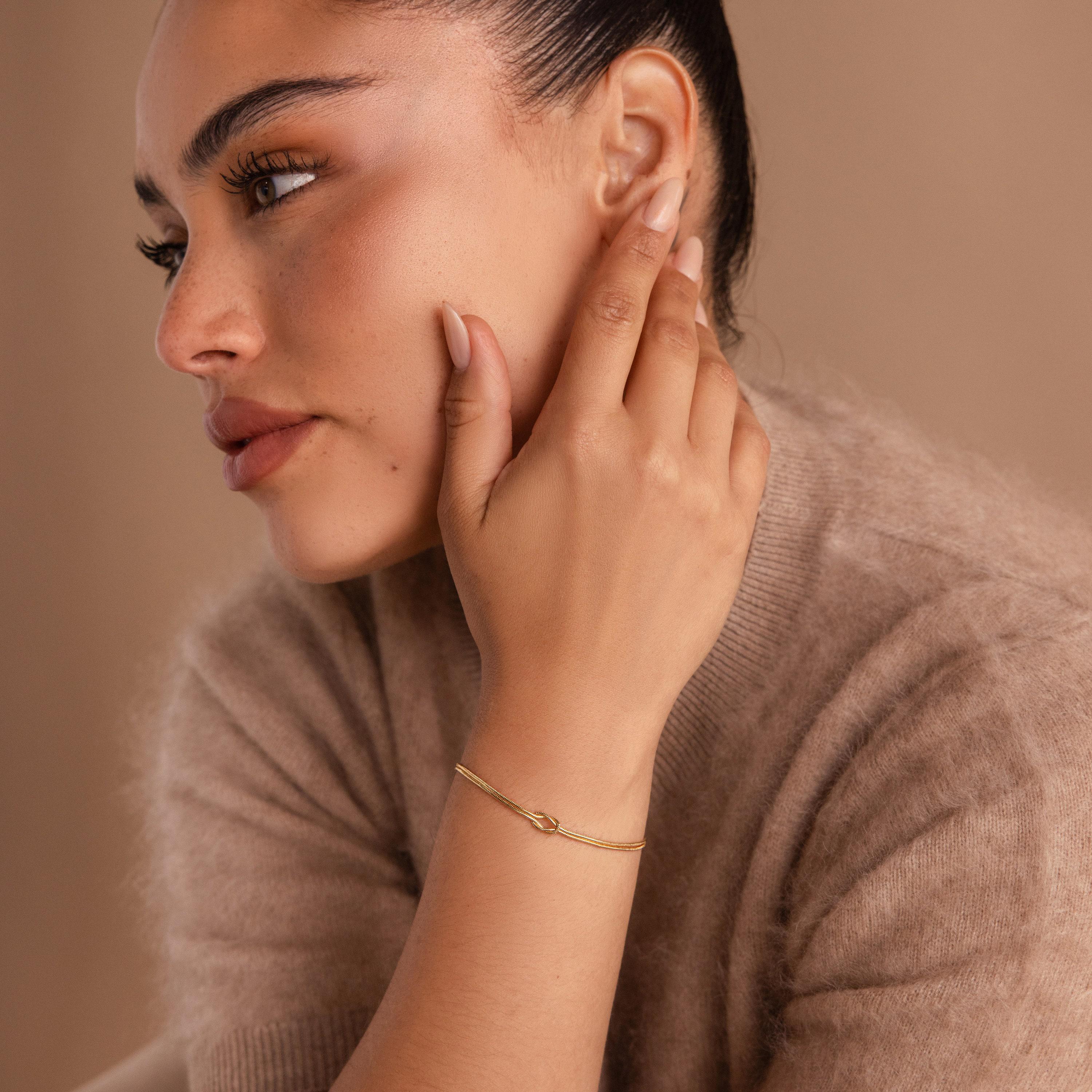 Double Snake Chain Love Knot Bracelet in 18K Gold Over Brass