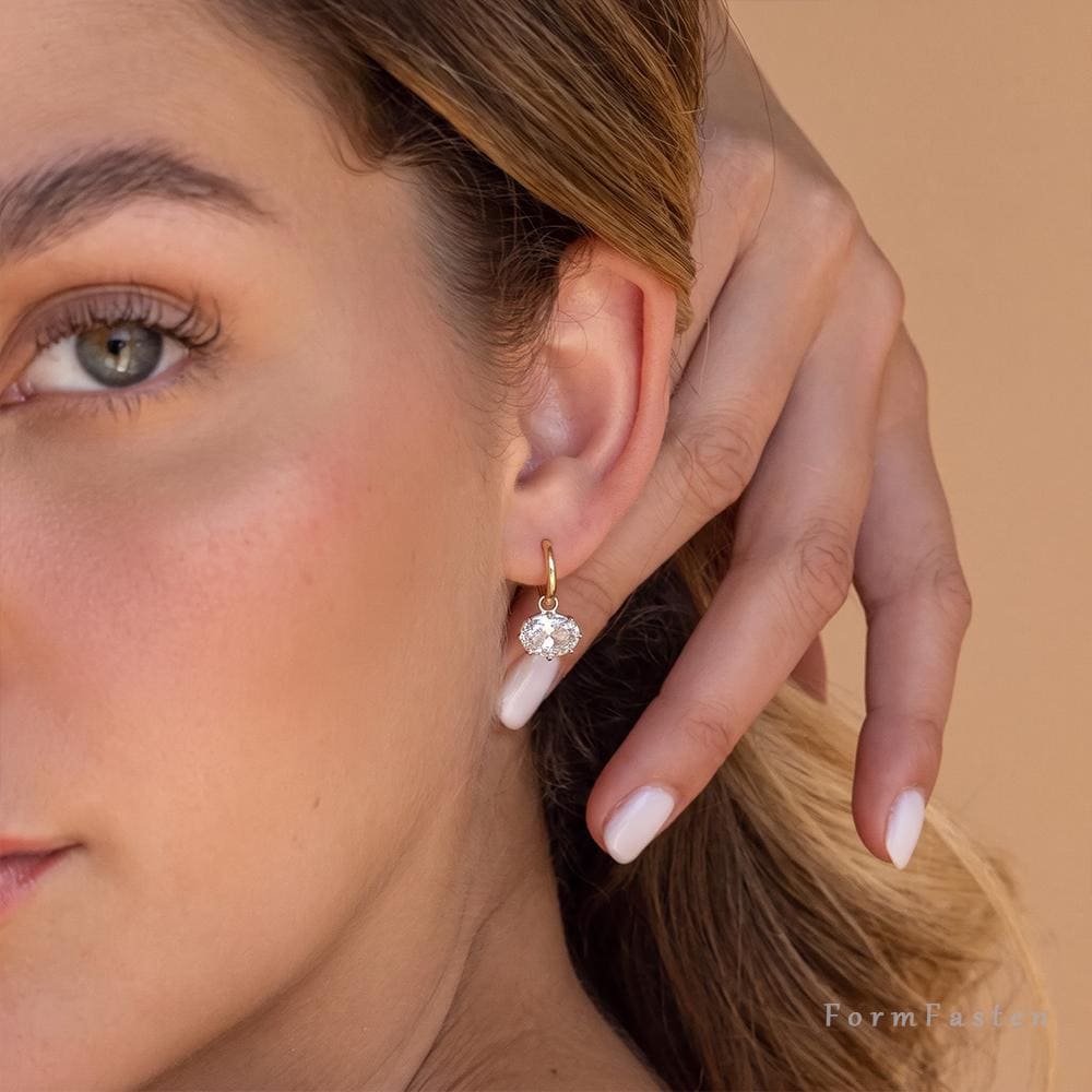 Floating Oval Cubic Zirconia Drop Huggie Earrings in Gold or Silver