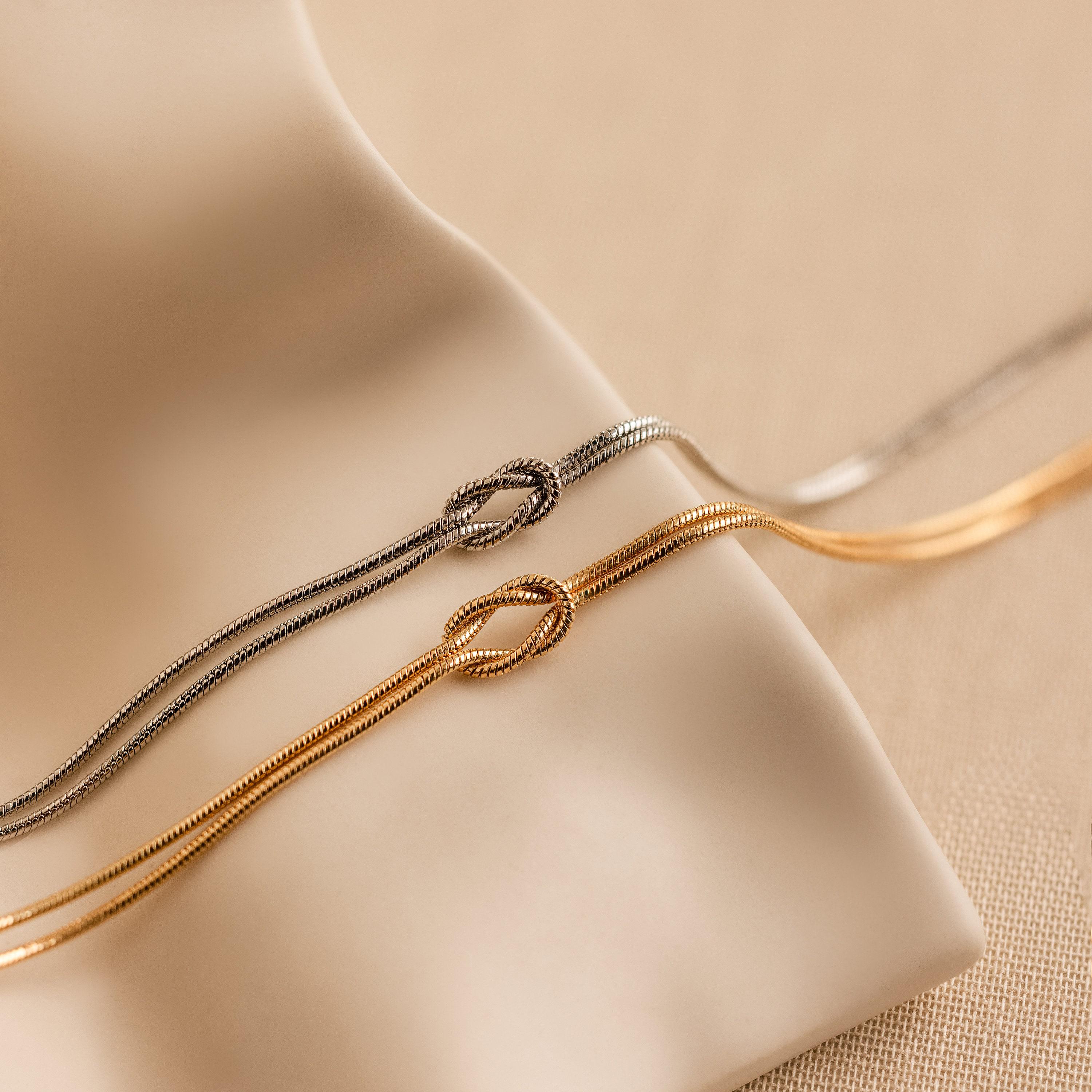 Double Snake Chain Love Knot Bracelet in 18K Gold Over Brass