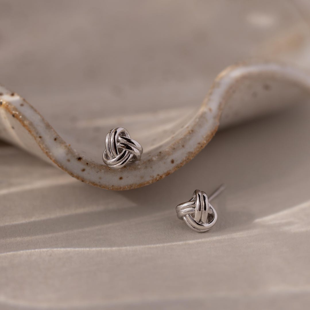 Love Knot Stud Earrings in 18K Gold Over Brass or Rhodium Over Brass