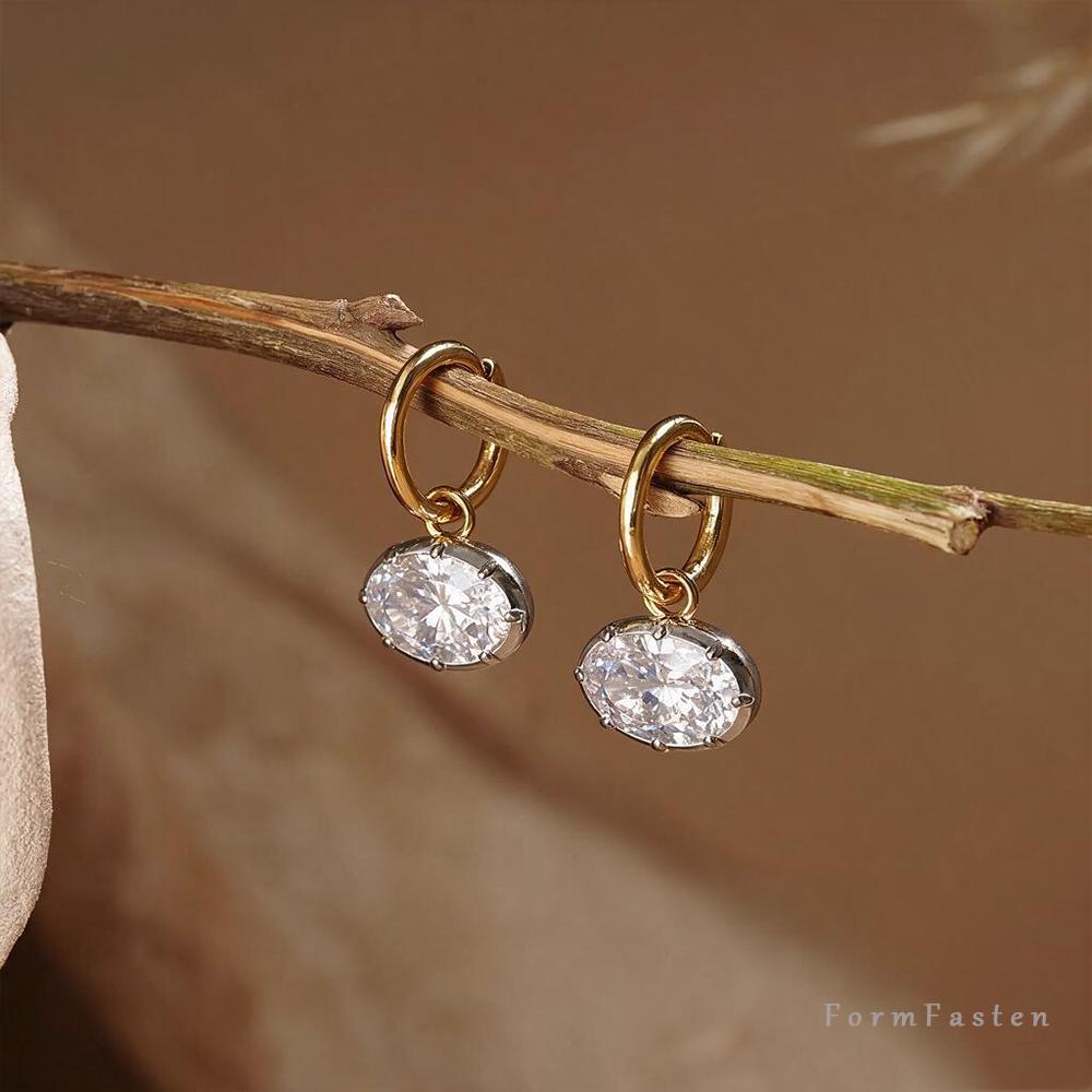 Floating Oval Cubic Zirconia Drop Huggie Earrings in Gold or Silver