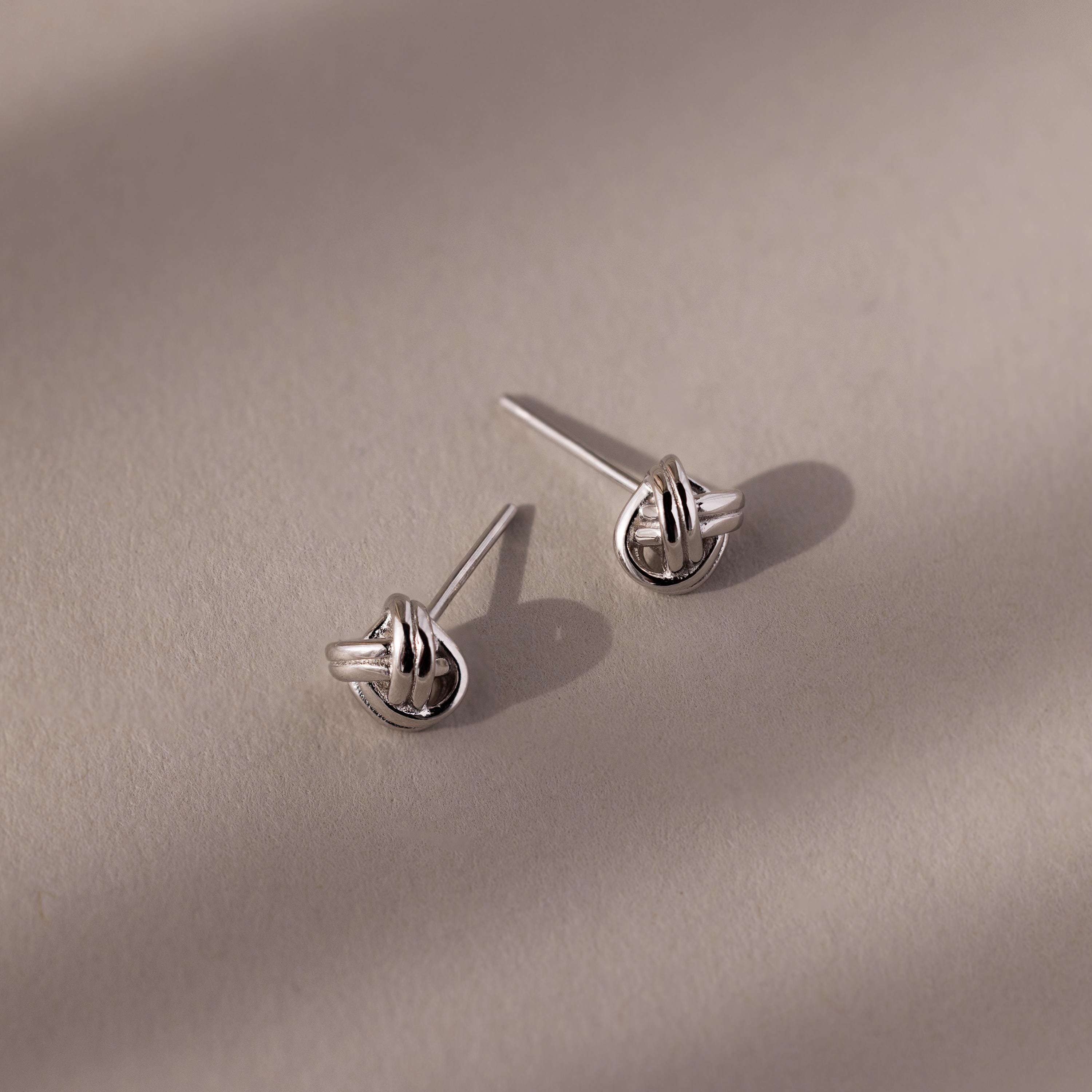 Love Knot Stud Earrings in 18K Gold Over Brass or Rhodium Over Brass