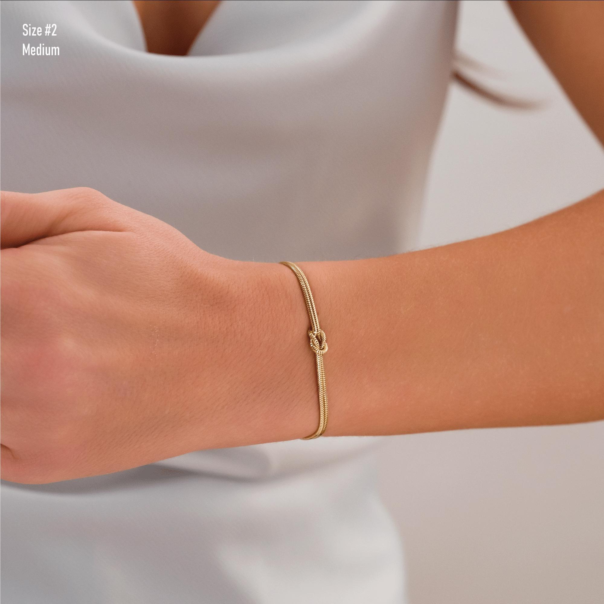 14K Gold Knot Bracelet with Herringbone Rope Chain