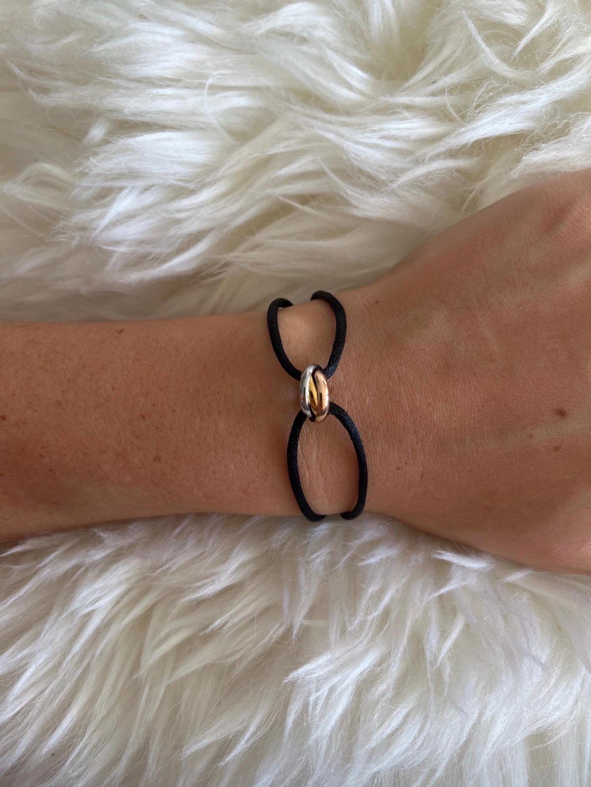 Adjustable Trinity Bracelet with Three Stainless Steel Rings on Silk Cord