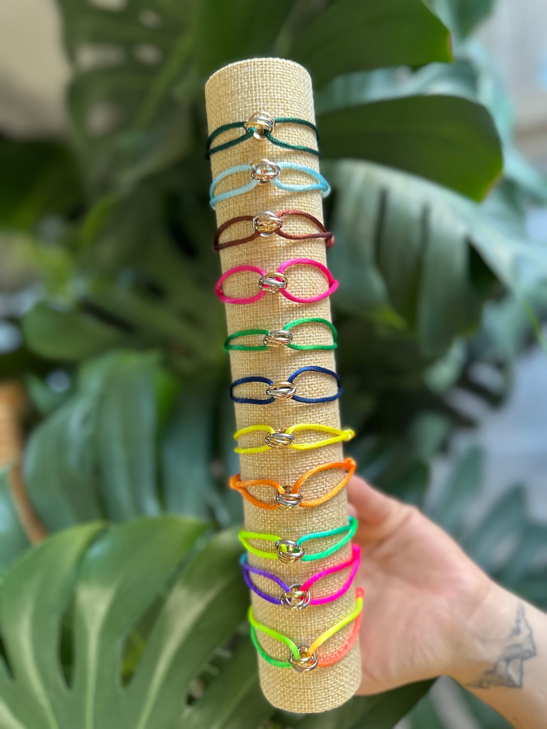 Adjustable Trinity Bracelet with Three Stainless Steel Rings on Silk Cord
