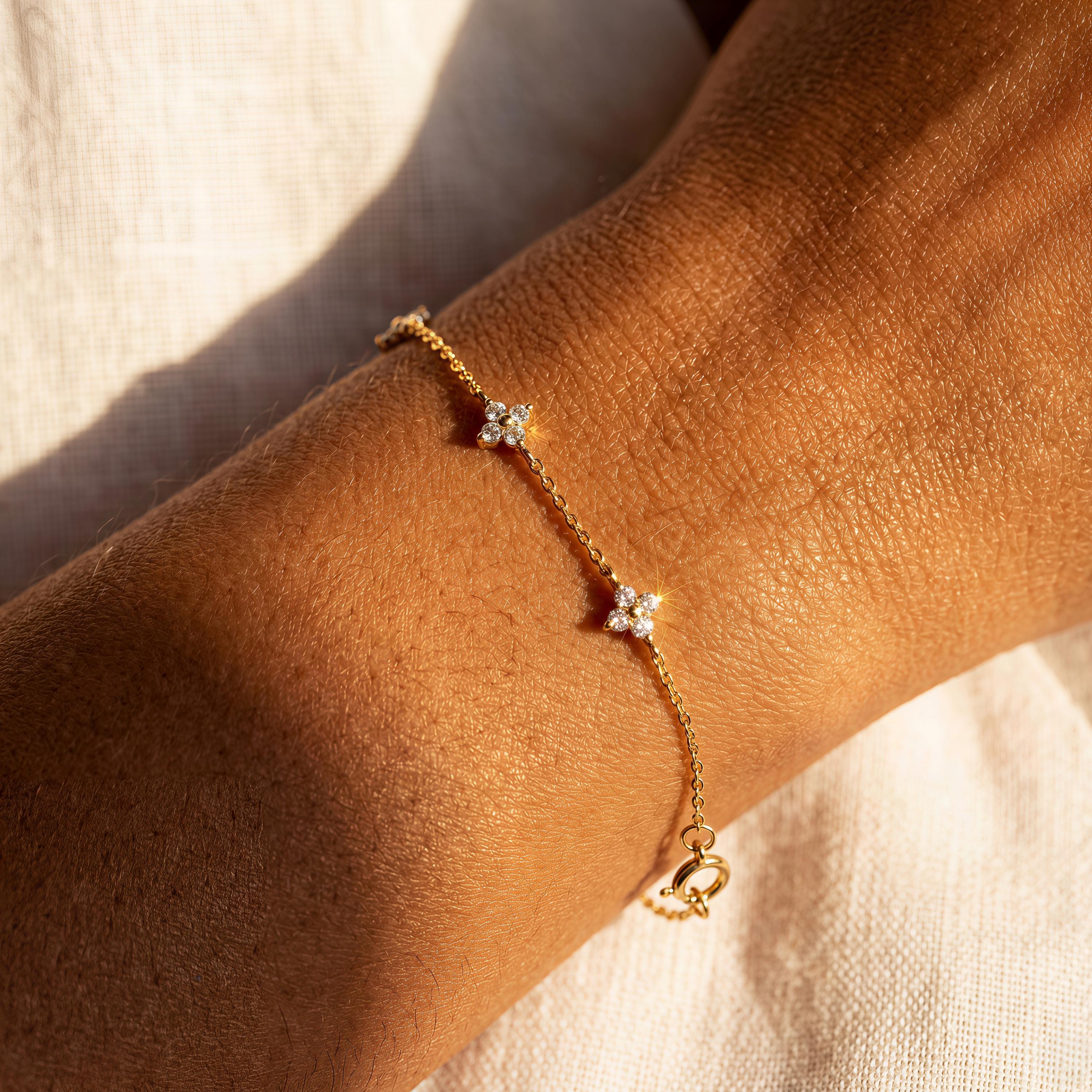 Gold Flower Charm Bracelet with Cubic Zirconia Blossoms