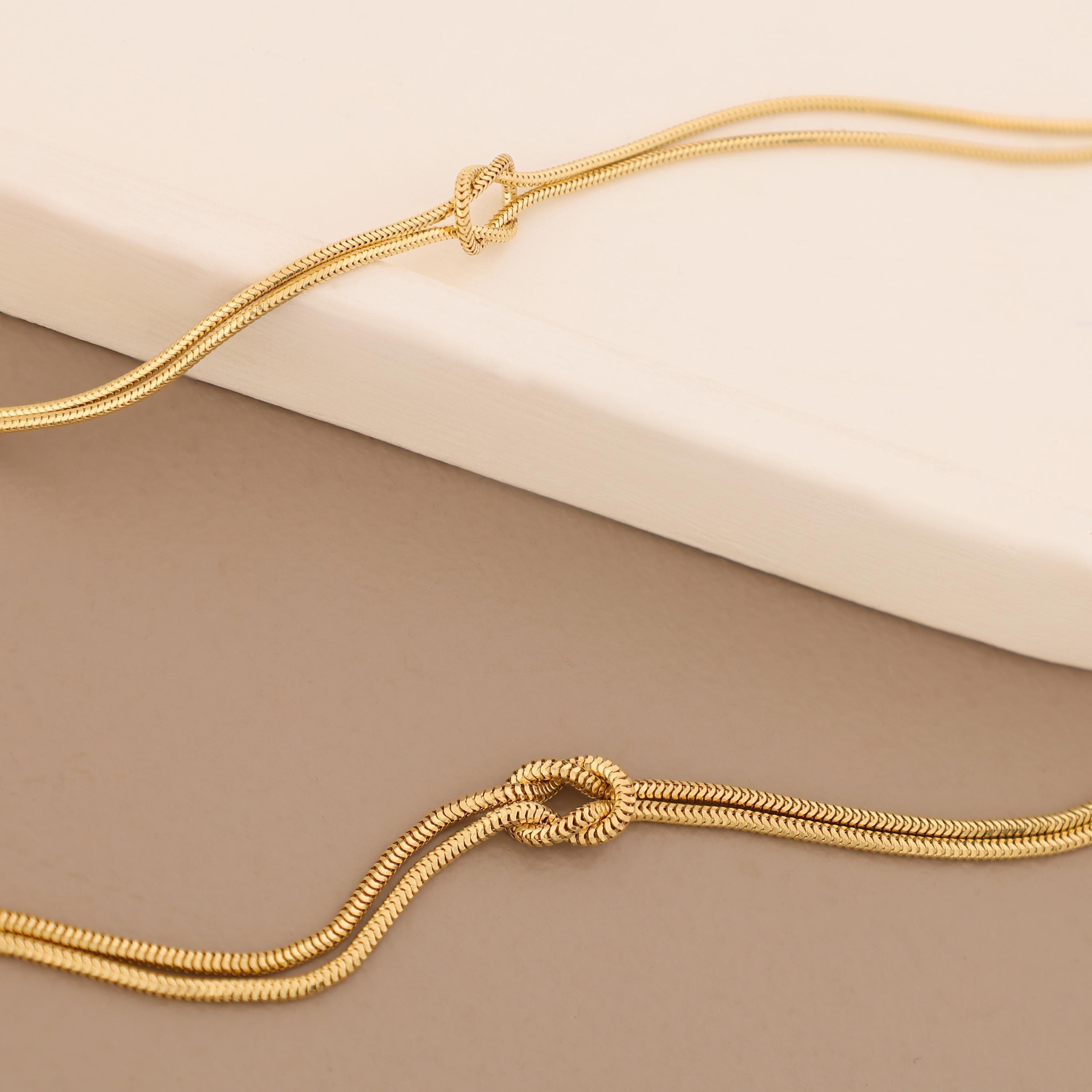14K Gold Knot Bracelet with Herringbone Rope Chain
