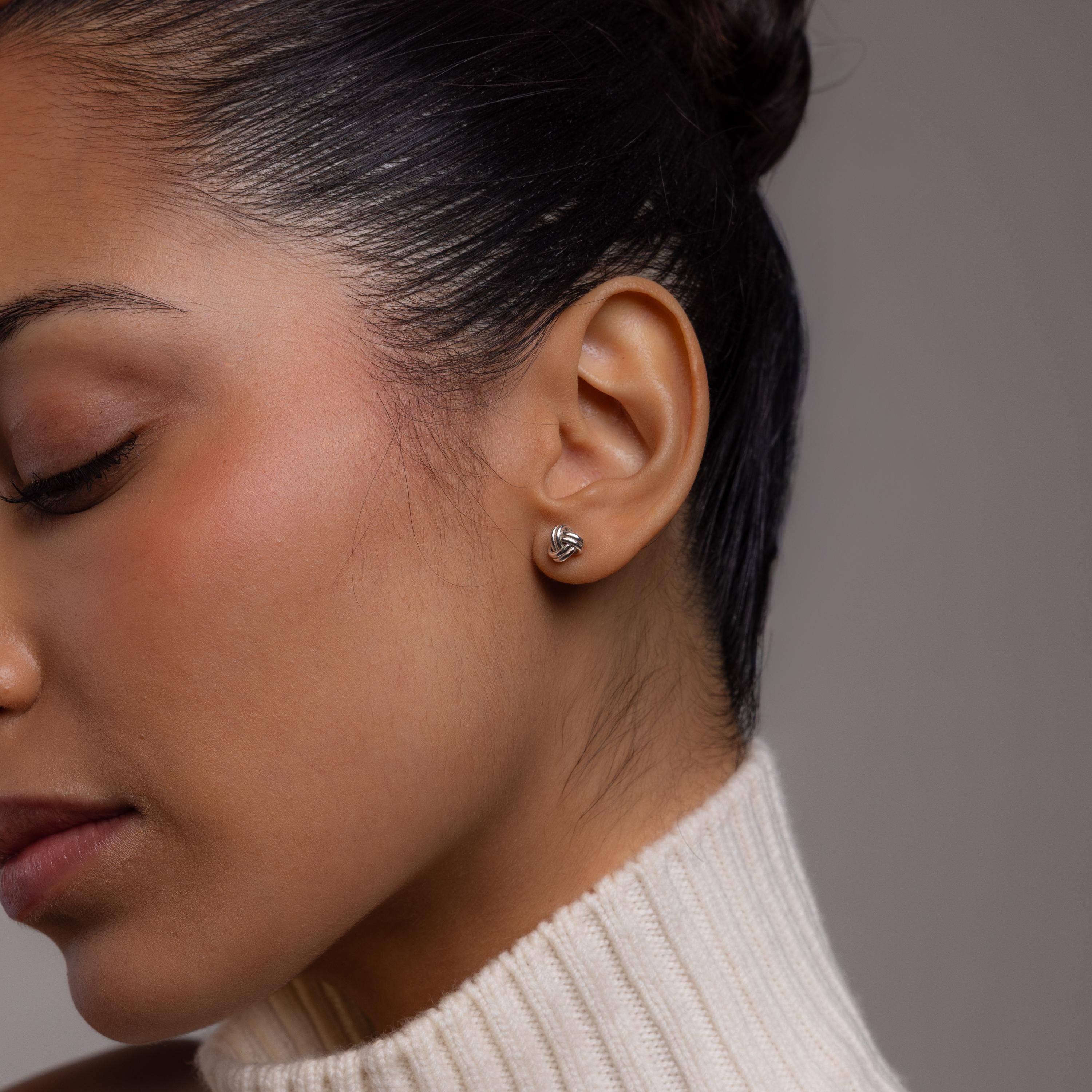Love Knot Stud Earrings in 18K Gold Over Brass or Rhodium Over Brass