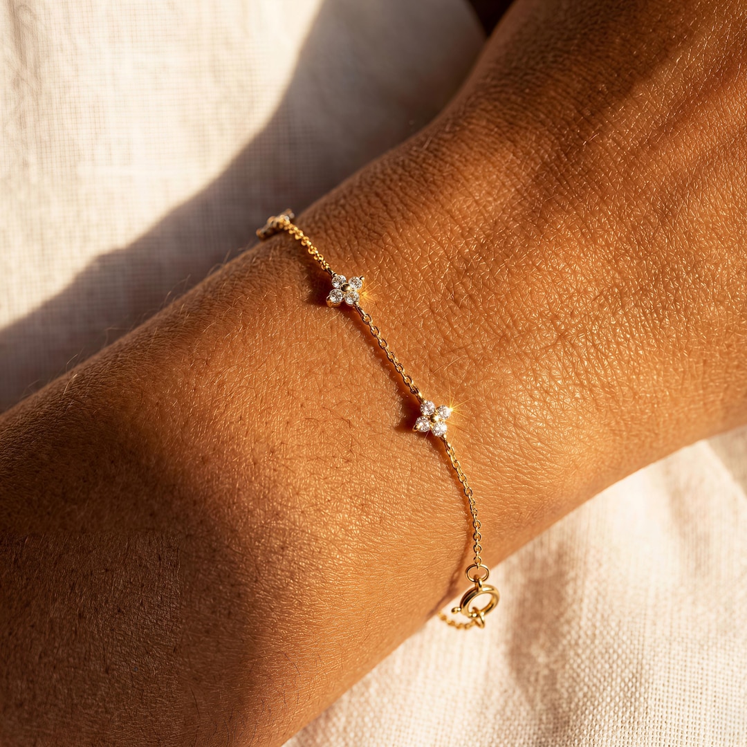 Gold Flower Charm Bracelet with Cubic Zirconia Blossoms